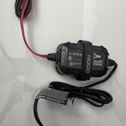 Batería Con Su Cargador Y Porta Baterías 