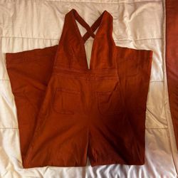 Rust orange Dollhouse plunge jumpsuit size 7