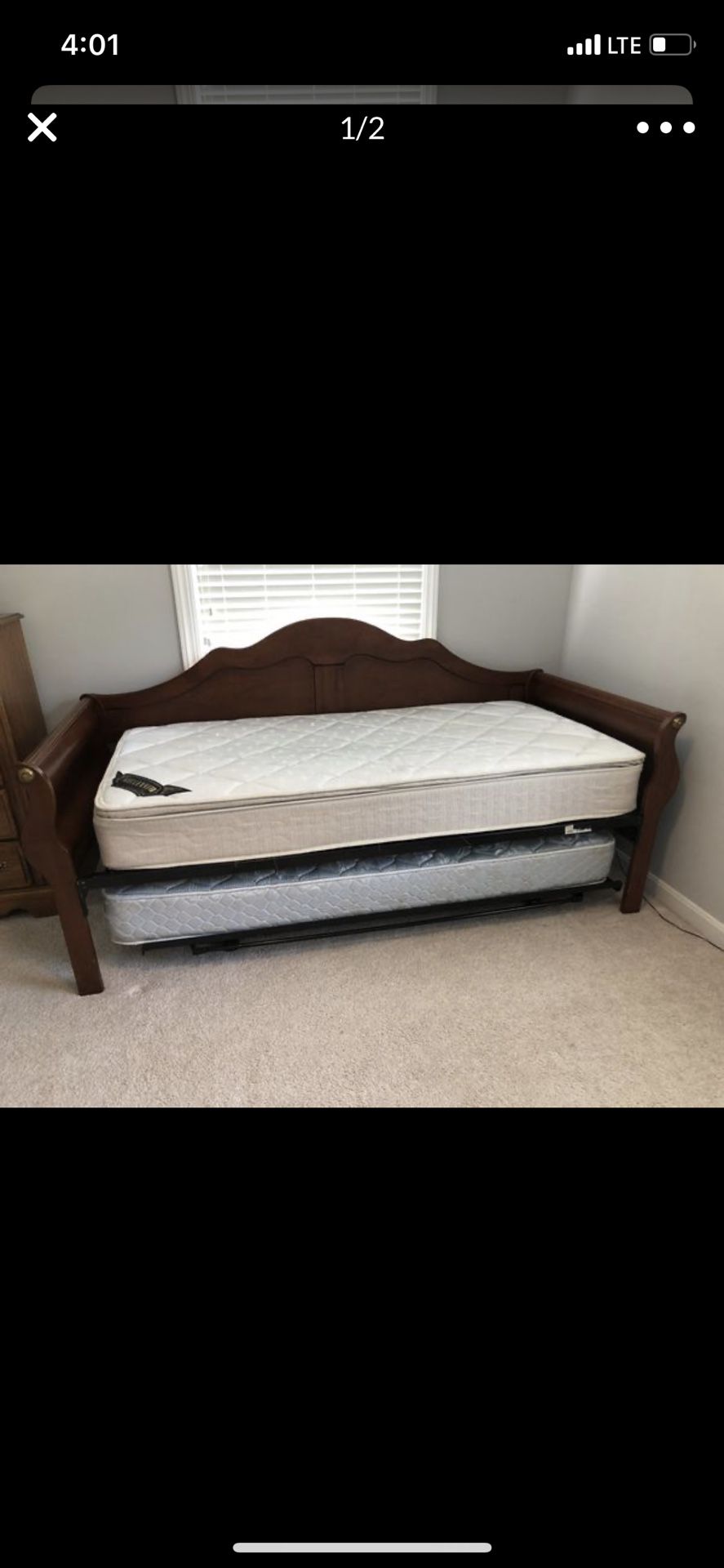 Daybed that pulls out to make a queen size bed.