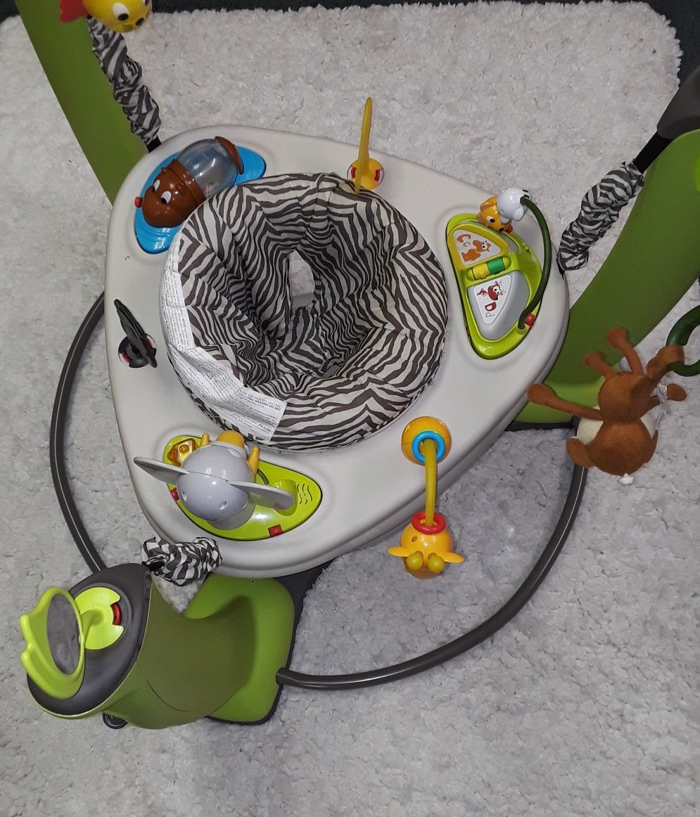 BABY EXERSAUCER JUMPER WITH LOTS OF TOYS!