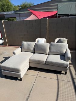 Small Cream Colored Sofa with Chaise