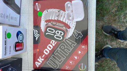 Smart watch with earbuds