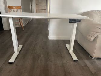 White mechanical standing desk