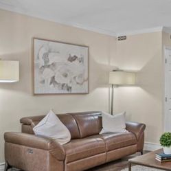 Leather Motion Reclining Sofa