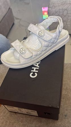 Channel and Lv sandals