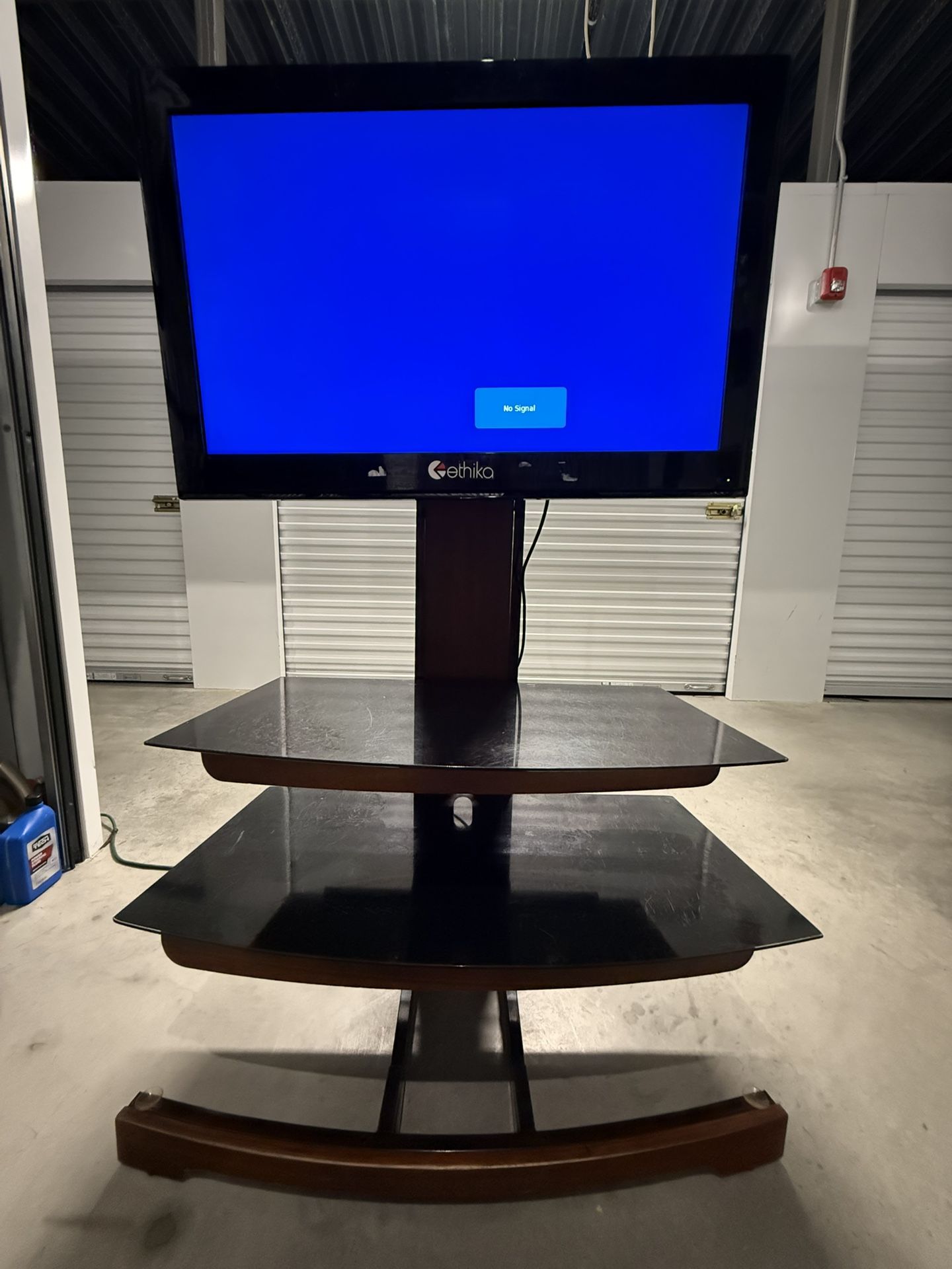 TV with a shelf