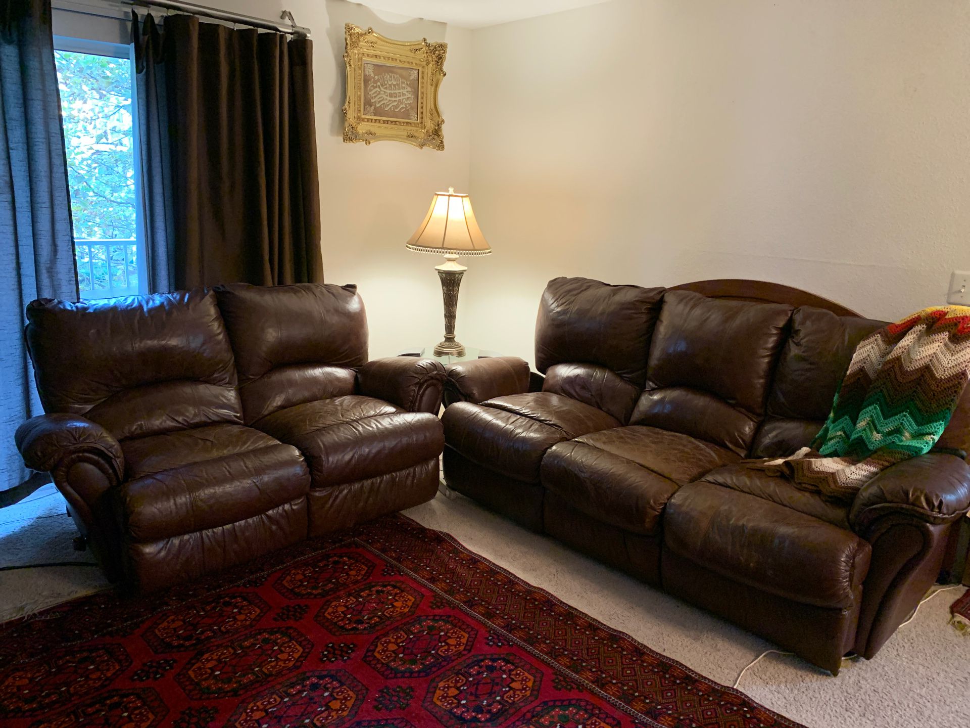Leather reclining sofas set.