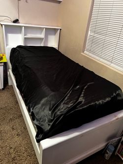 Twin size bed with mattress and box spring