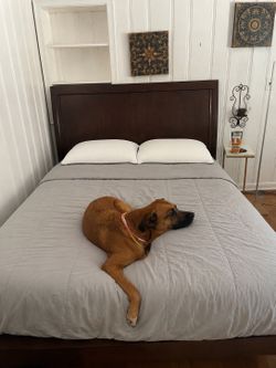 Wooden bed and mattress