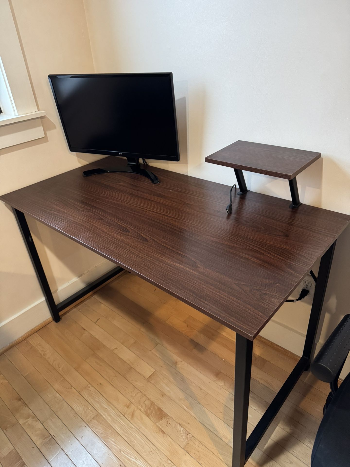 Wood and black metal desk with black desk chair