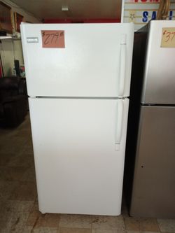 White Refrigerator ex large excellent . Warranty , Delivery available 2203 Fowler st. Ft. Myers 33901