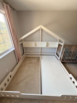 Two kid platform bed with house headboard  on sale