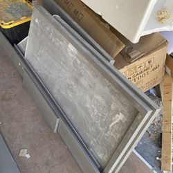 Gray Countertop With Backsplash 