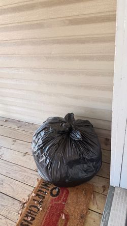 Large bag of kids clothes and women’s clothes