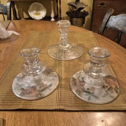 Set of three clear glass candle holders