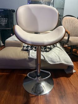 Adjustable bar stool