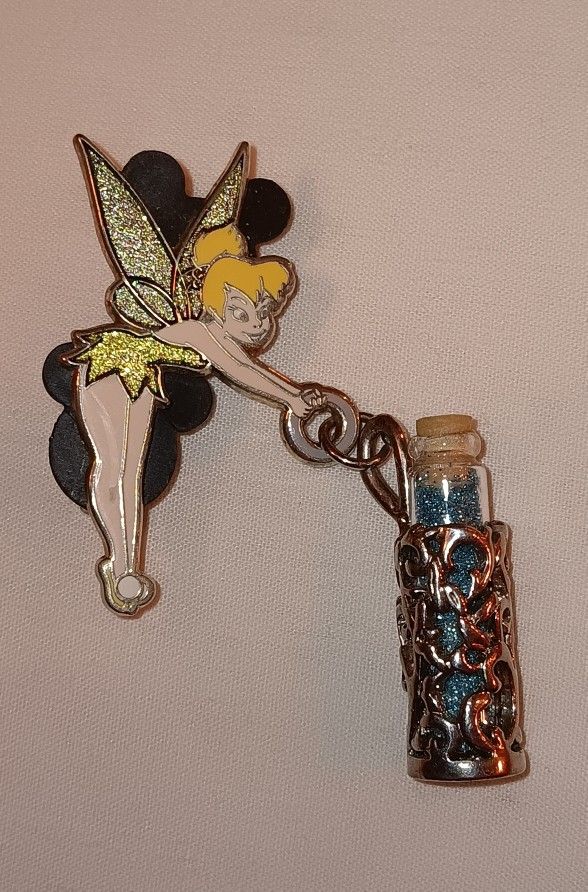 Disney Tinkerbell pin with glass bottle of pixie dust PRICE IS FIRM 