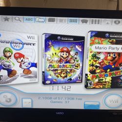 NINTENDO WII + 30 WII GAMES MARIO KART,MARIO OARTY 9,WII SPORTS,SMASH BROS. and More