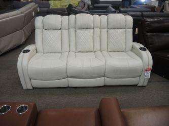 Kinetic Cream Leather Reclining Sofa — Diamond-Tufted, Dual Cup-Holder Consoles