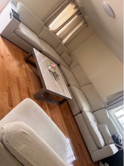 A large sectional living room seven pieces