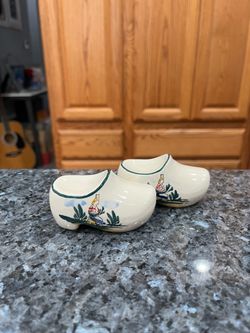 Vintage Ceramic Dutch Clog Shoe Pair of Salt and Pepper Shakers.  With original Cork Stoppers.  Preowned.  Has been on display in a cabinet with a ver