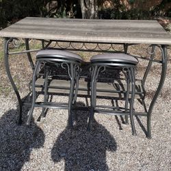 Wine table with spinning stools