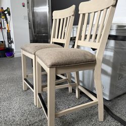 2 tall  dining chairs from American Furniture Warehouse 