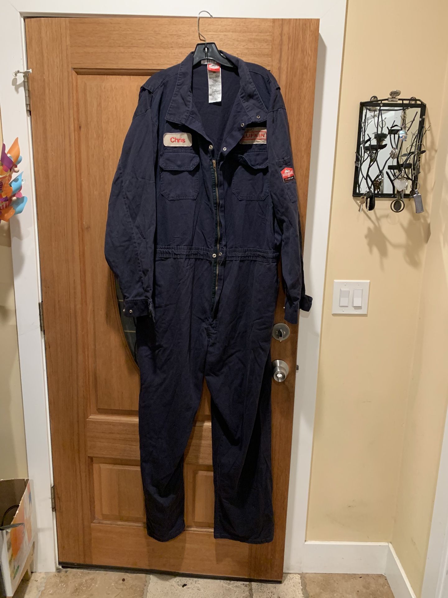 Work overalls. Sizes: 38, 48, L, Color grey. Good condition. Price: $10 each.
