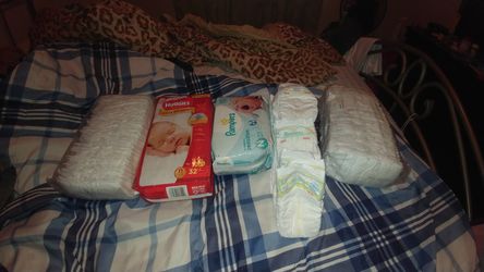 Newborn Diapers & Some Size 1 Diapers