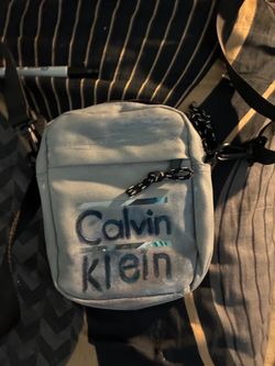 Small unisex messenger or phone bag