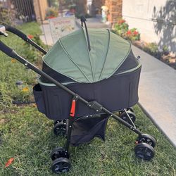 Pet Stroller Basket and Wagon style. Pet weight limit 55lbs.  Brand New folding stroller