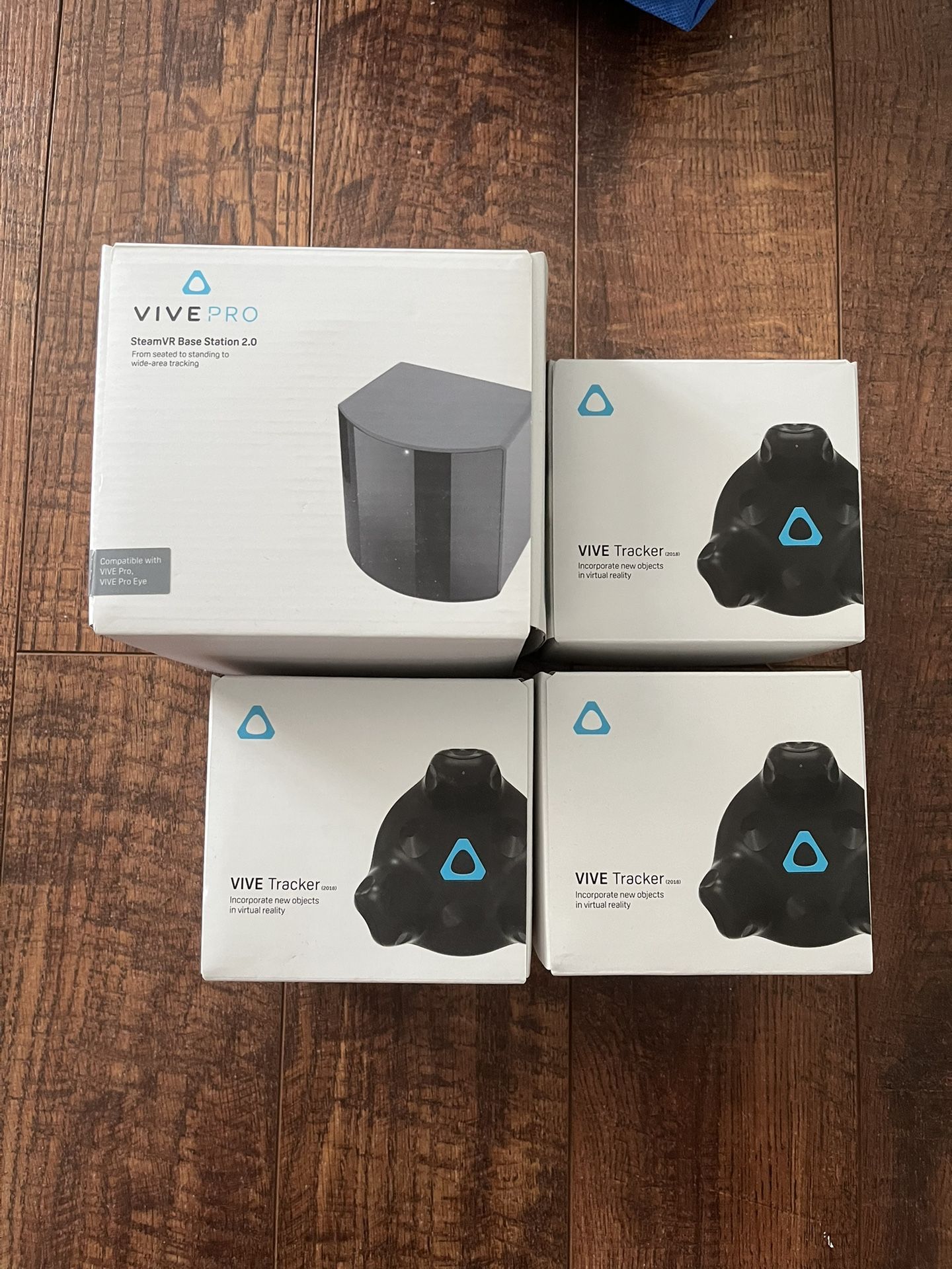 3 HTC Vive 2.0 Trackers And Vive Pro 2.0 Base Station.