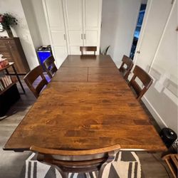 Solid wood dining table and 6 chairs For Sale