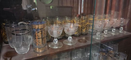 Various antique and vintage glassware.
