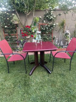 Patio Table With 2 Chairs In Good Condition 