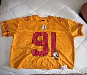 Disney Belle football jersey with red number 91 and cartoon character graphic
