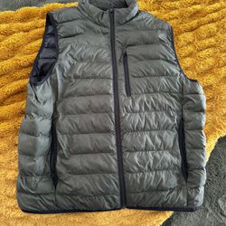 Green puffer Vest (size L)