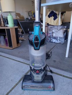1 Vacuum Cleaner And 1 Carpet Cleaner.  Both fixer uppers.