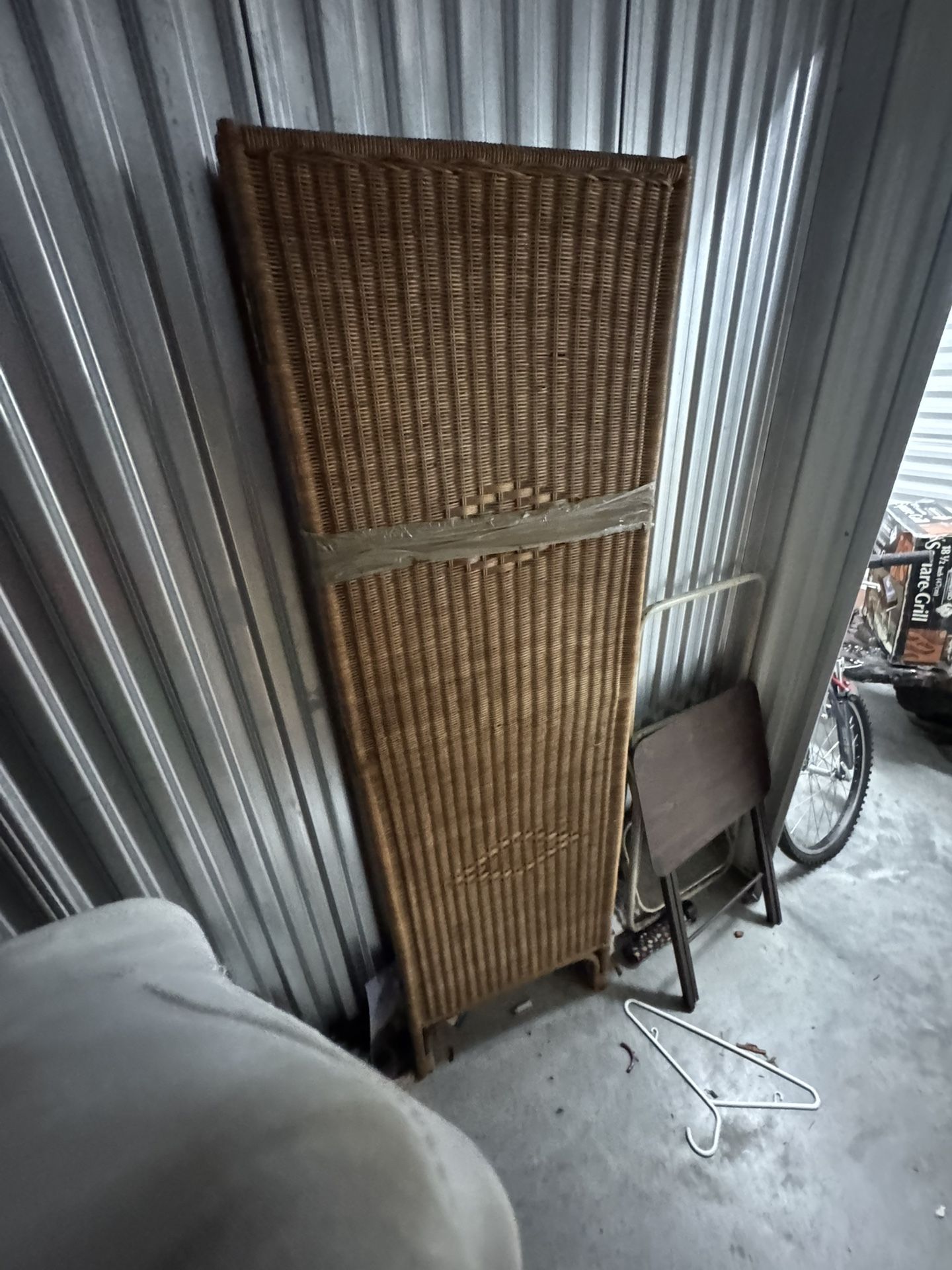 A wicker screen from the middle of the 20th century made of woven rattan Philippines.