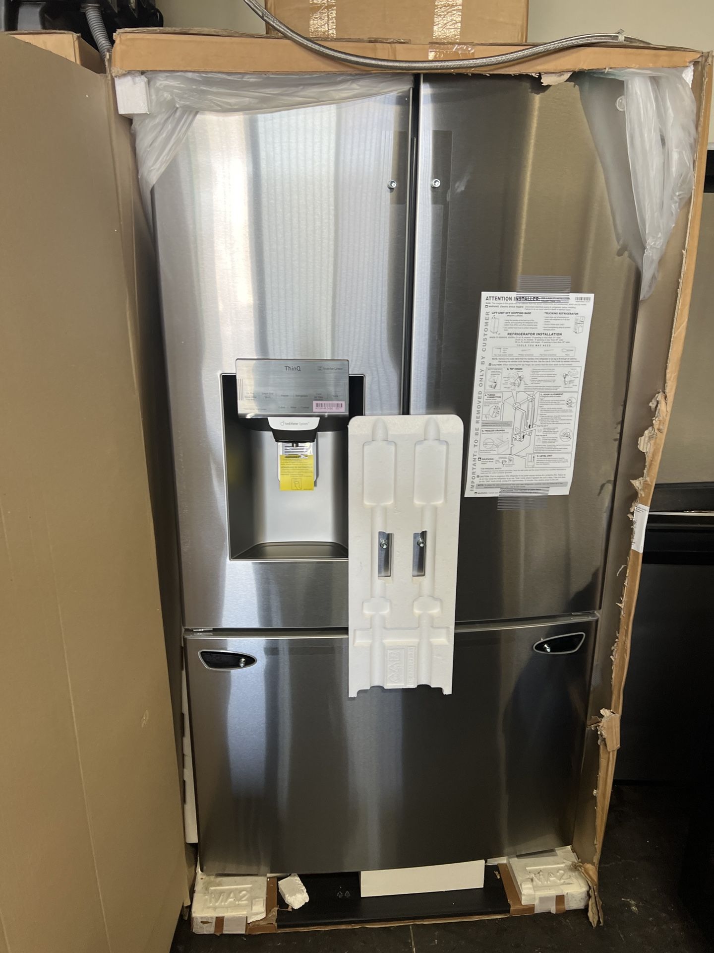 NEW IN BOX LG FRENCH STYLE STAINLESS STEEL REFRIGERATOR