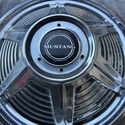 Early Mustang hubcaps