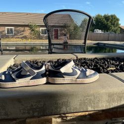 Blue and white Nikes