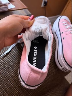 Converse shoes .