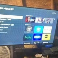 50in Tv Tv Mount And A Bluetooth Speaker