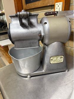 Industrial cheese grater