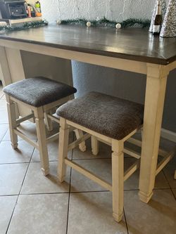 Ashley’s Counter height table and 2 stools
