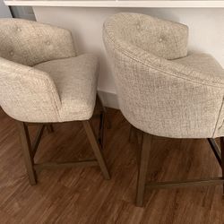 2 Ashley Swivel Barstools 