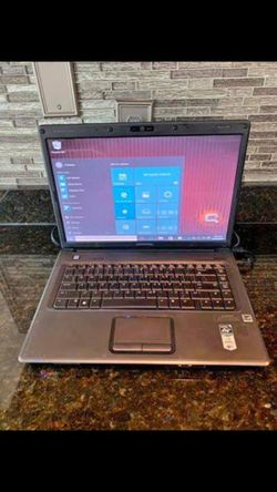 15.4” HP Compaq Presario F700 with Webcam,Windows 10 and Microsoft Office.