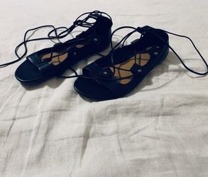 Lace up black flats . Size 8 women
