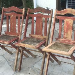 Three Wood Folding Chairs With Asian Design